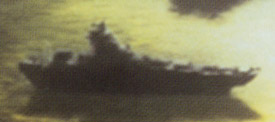 Carrier escort ship at sunrise